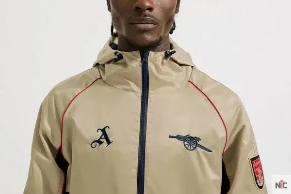 Veste coupe-vent rétro dorée d’Arsenal Clanton Jacket